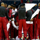 Miami Heat players discard white warm-up shirts at mid-court before Monday’s Game 4 win against the Charlotte Bobcats in a show of solidarity with the Los Angeles Clippers players.
Youtube